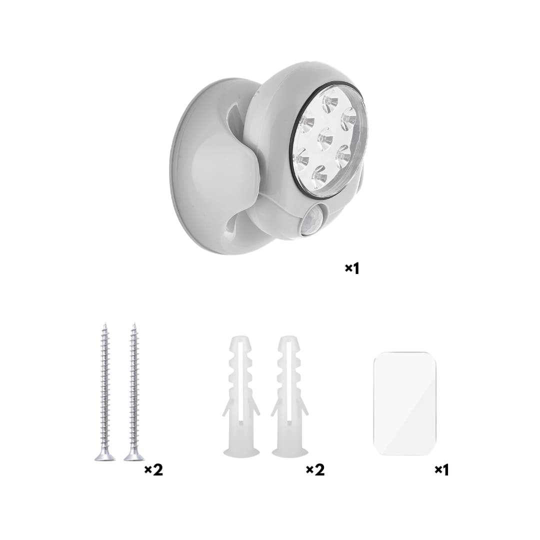 Vista lateral de lámpara LED giratoria con base adhesiva en armario