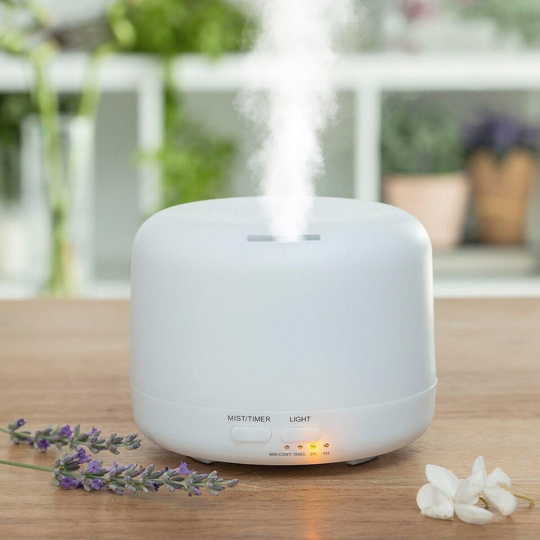 Detalle del botón táctil del difusor de aromas con modos de iluminación y temporizador