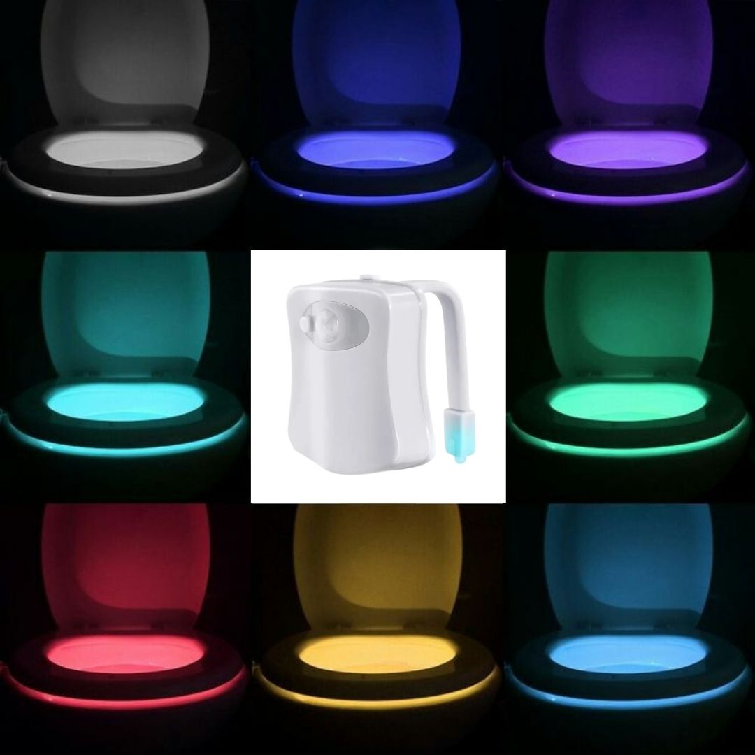Luz LED para inodoro instalada en taza blanca con luz roja encendida