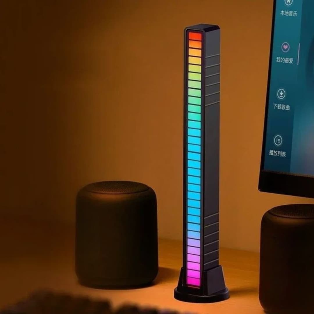 Barra LED rítmica iluminando habitación con luces multicolor al ritmo de la música