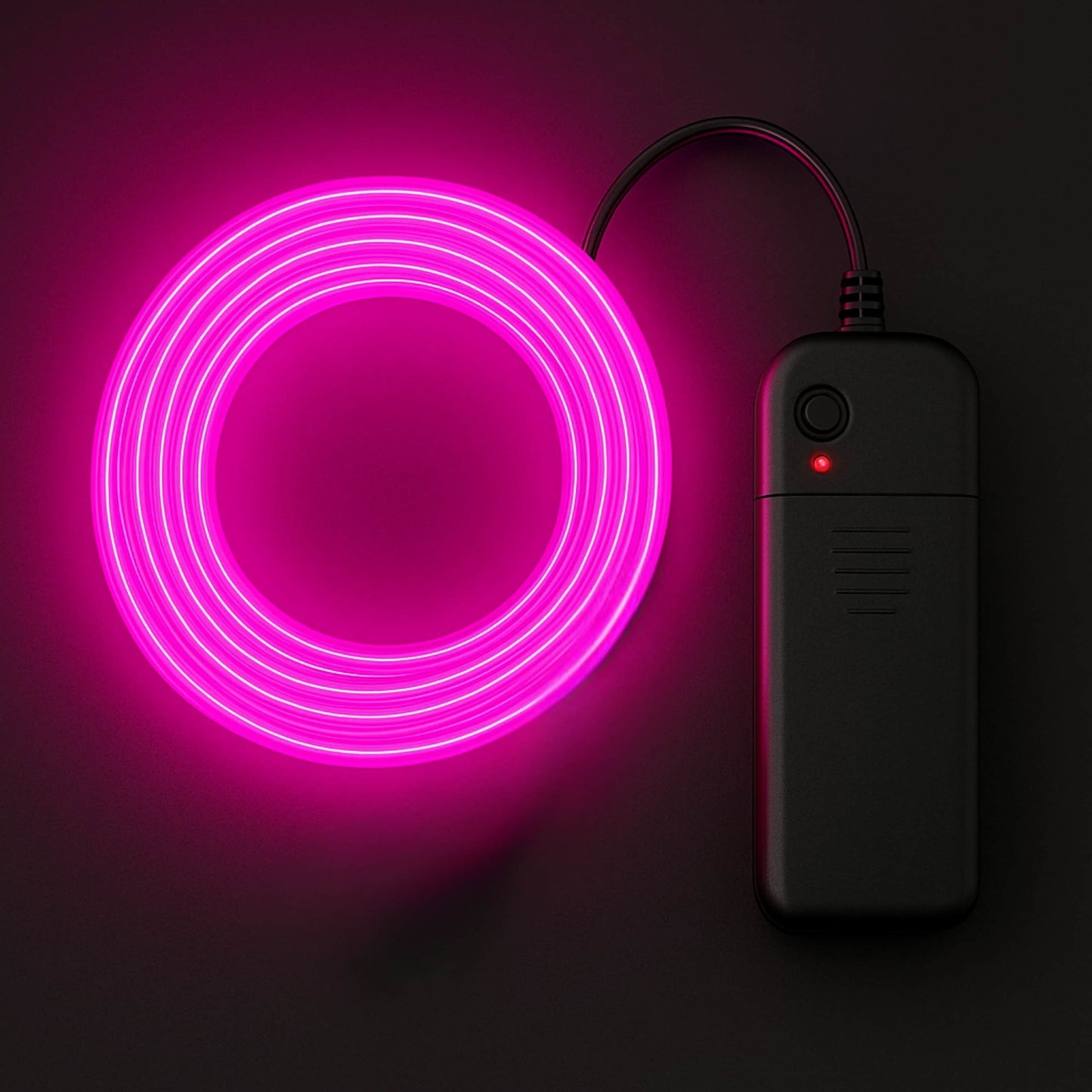 Cable neón rosa encendido en ambiente oscuro, ideal para decoración con luz ambiental.