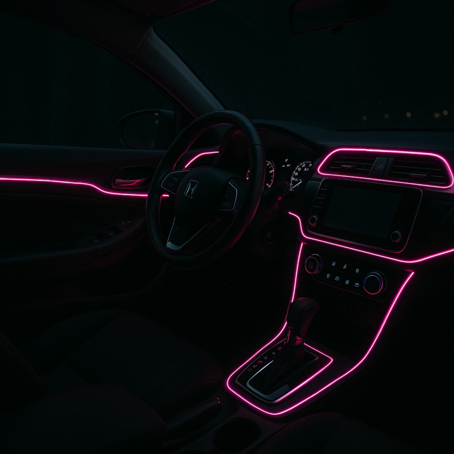 Cable neón rosa iluminando interior de coche para una atmósfera moderna y original.