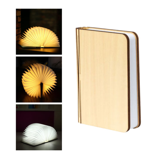 Lámpara LED plegable con diseño de libro abierta y encendida con luz cálida.