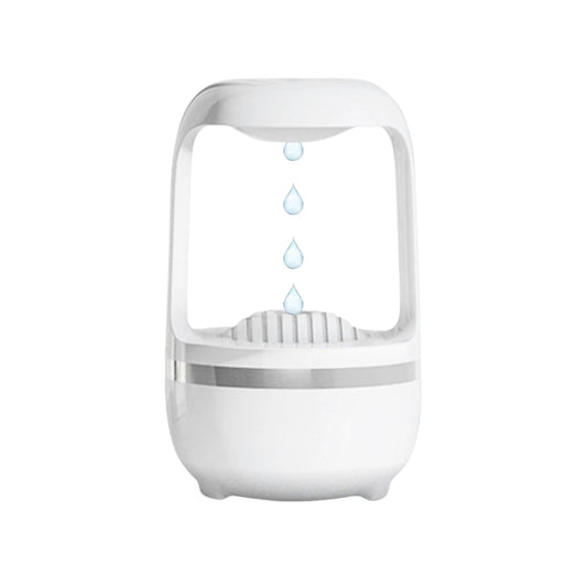 Humidificador antigravedad 500ml con luz LED blanca sobre escritorio moderno