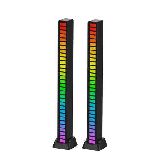 Barra LED rítmica negra con 32 luces activadas por sonido en escritorio gamer