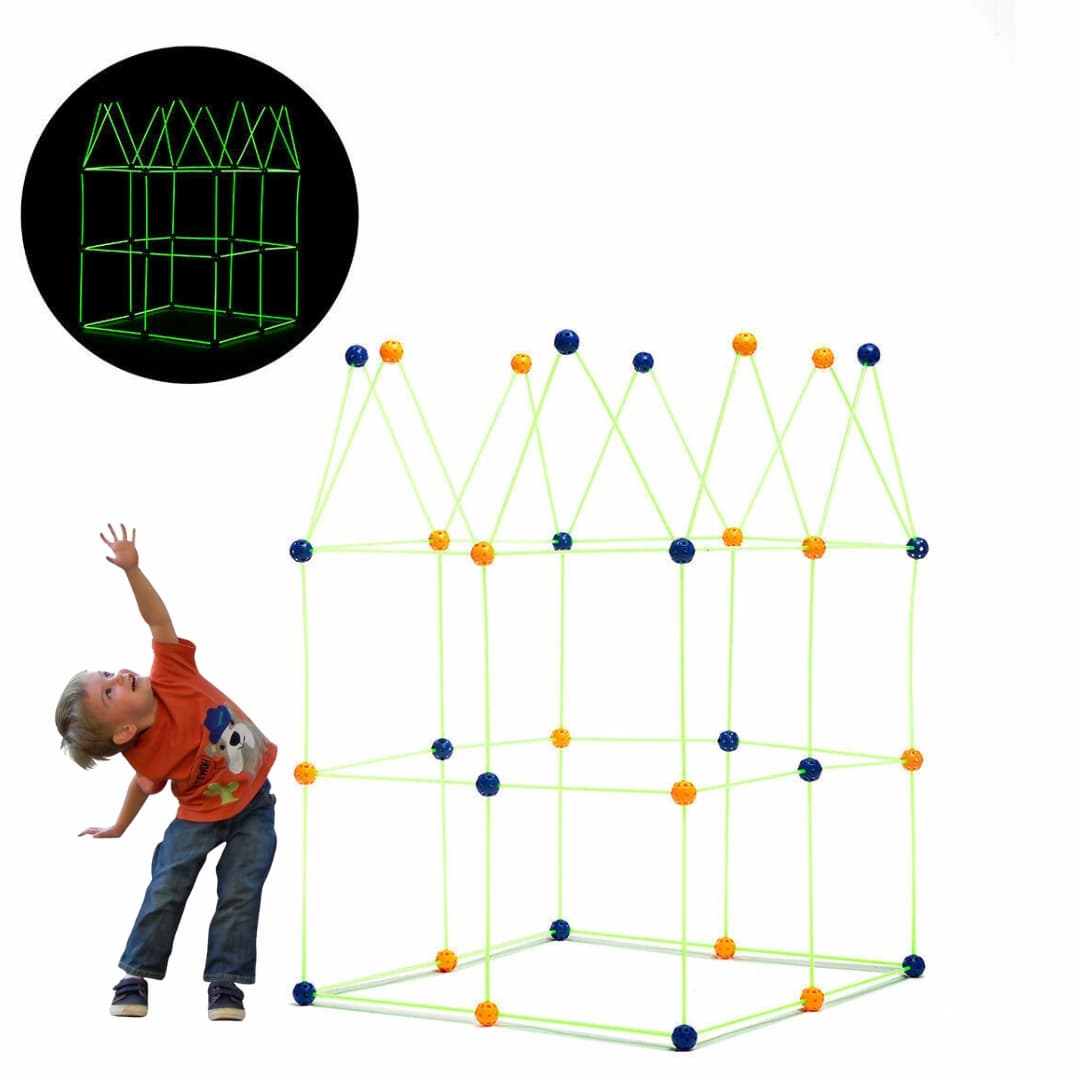 Niño construyendo fuerte con bloques fluorescentes de 155 piezas y tela incluida