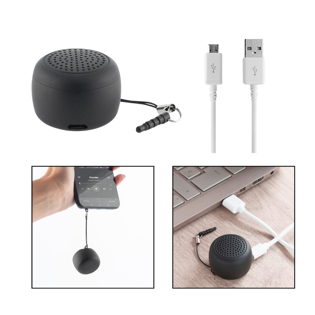 Vista lateral del mini altavoz Bluetooth mostrando botón multifunción y cordón colgante