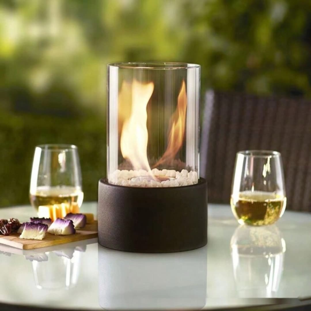 Accesorios incluidos: piedras decorativas, mechas y apagador para chimenea de bioetanol