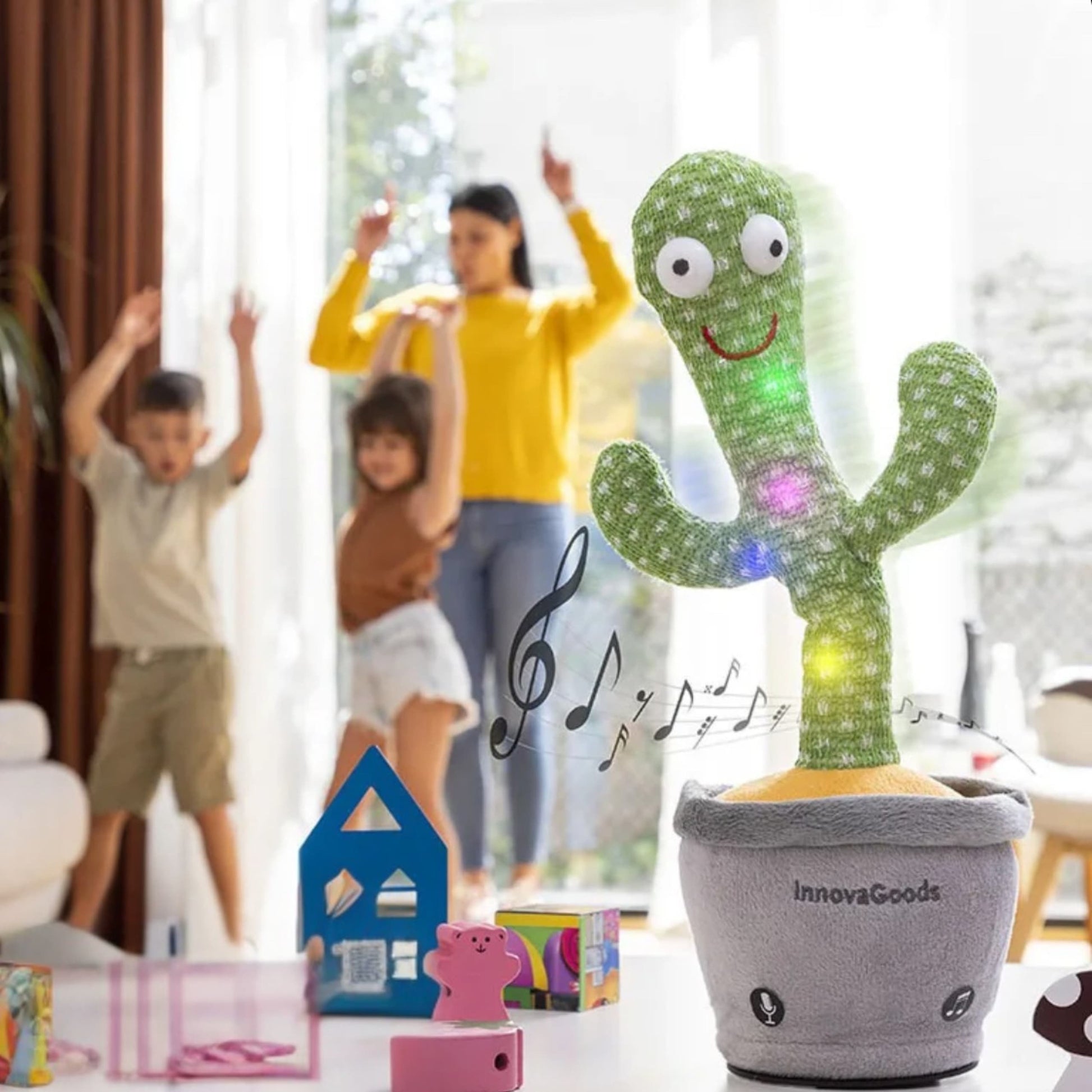 Empaque del cactus interactivo con descripción de 120 canciones y carga USB