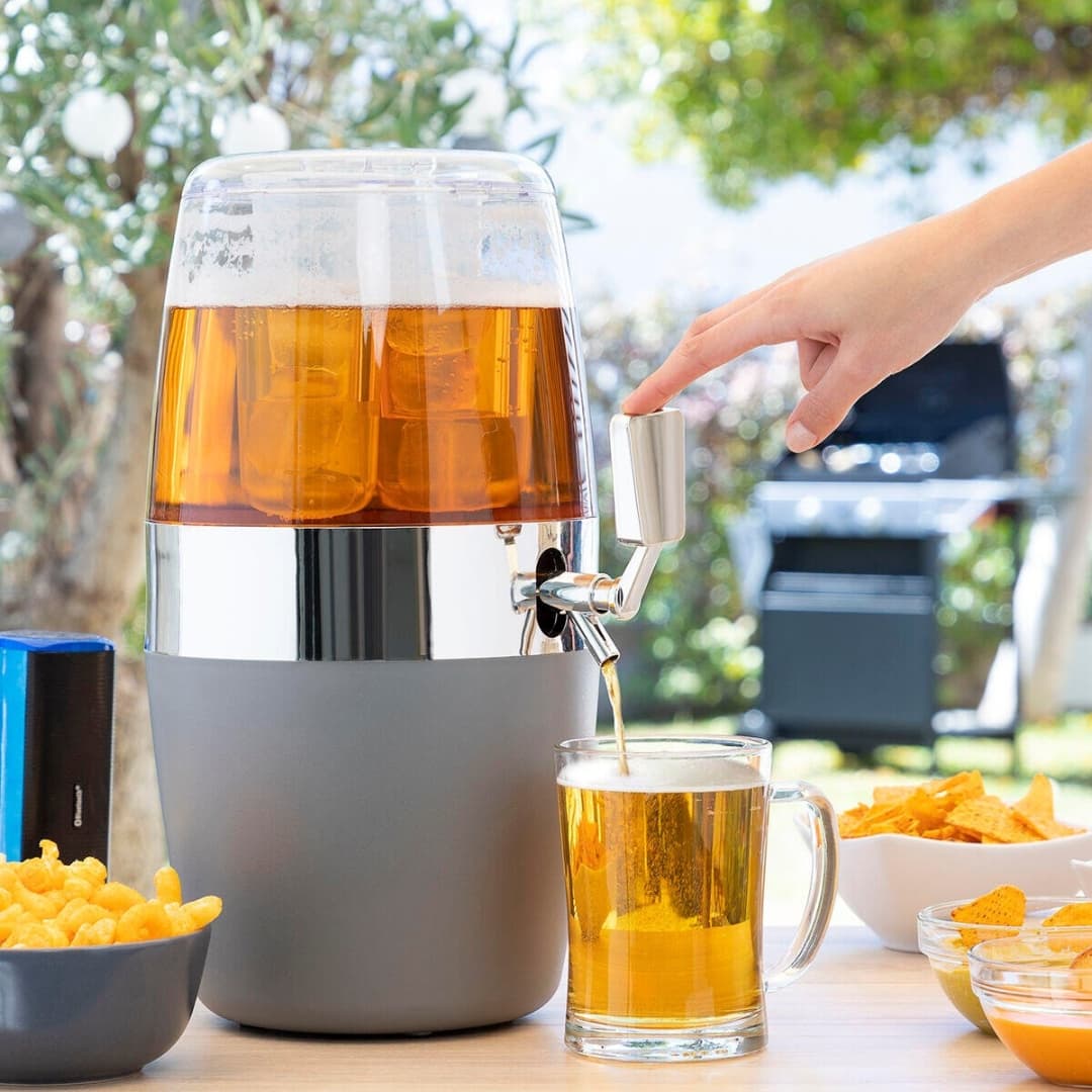 Vista superior del dispensador de bebidas con compartimento de almacenaje inferior