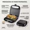 Especificaciones Técnicas y Medidas de la Prensa Panini Infografía de la sandwichera grill profesional mostrando potencia de 750W, dimensiones de 22.3 cm y superficie antiadherente.